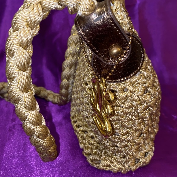 Luxy crossbody bag . Crocheted. Gold color. 9 inches wide x 7 inches tall. - Picture 4 of 7